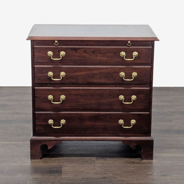 Stickley Chippendale-style bachelor's chest end table with brass accents, classic design.