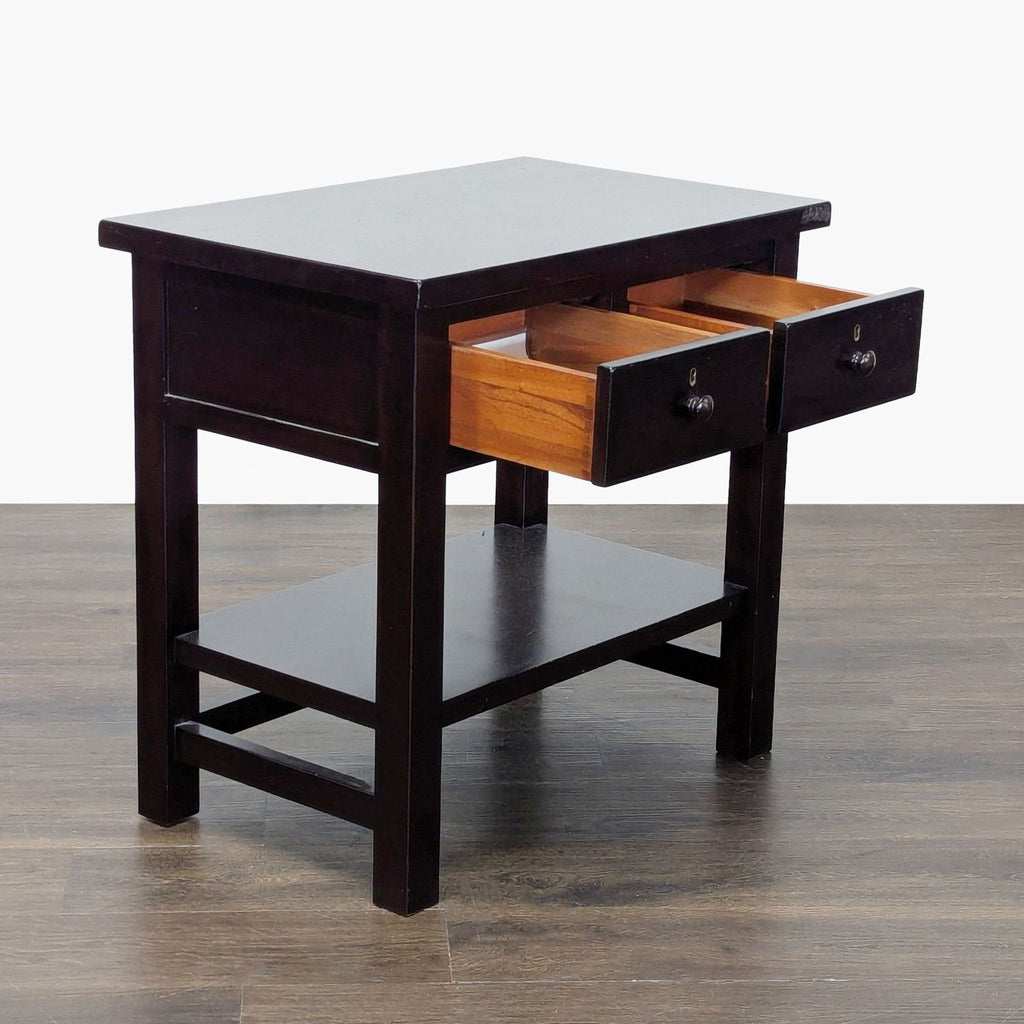 2. Dark Pottery Barn end table featuring open bottom shelf, kiln-dried wood, and two front drawers partly open.