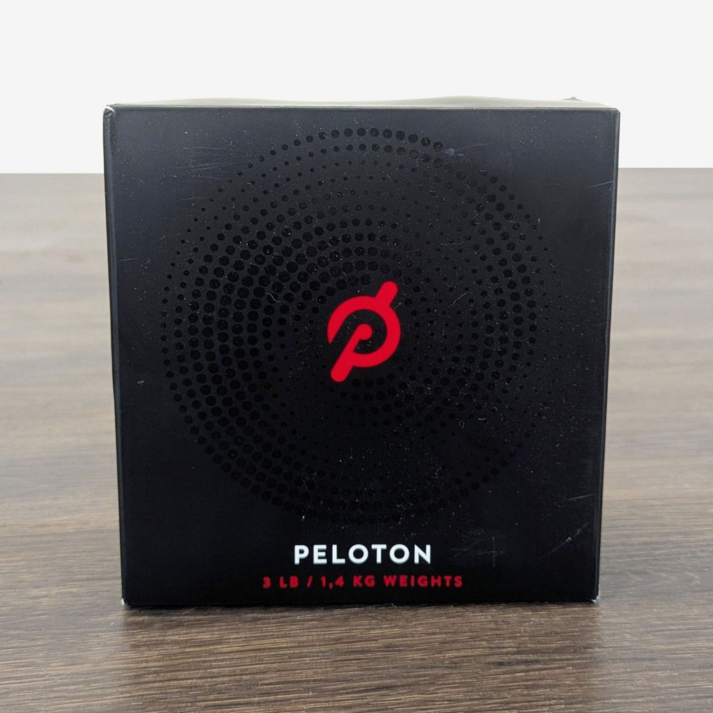 Pair of new Peloton 3 lb weights in original box, ideal for home gym strength training and cardio.