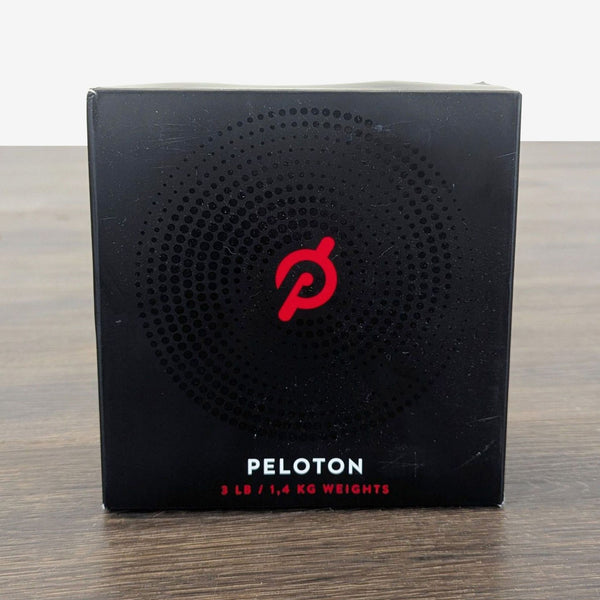 Pair of new Peloton 3 lb weights in original box, ideal for home gym strength training and cardio.