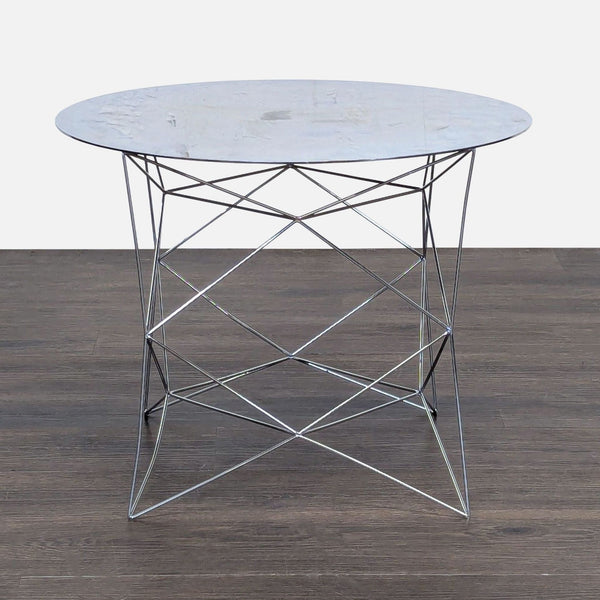 1. Modern West Elm console table with marble top and geometric metal wire base, shown on wooden floor.