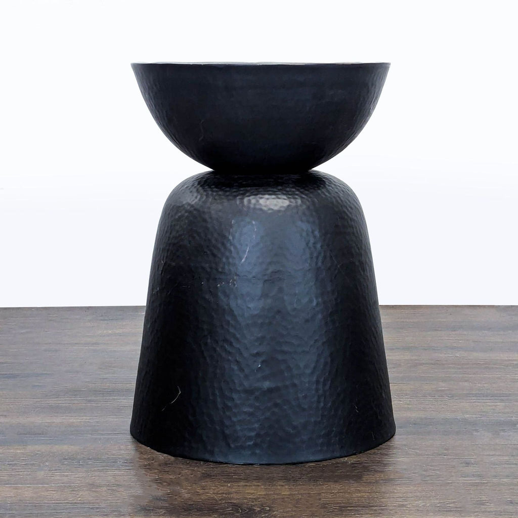 Hammered iron console table with bronze lacquer topcoat, crafted by Crate & Barrel.
