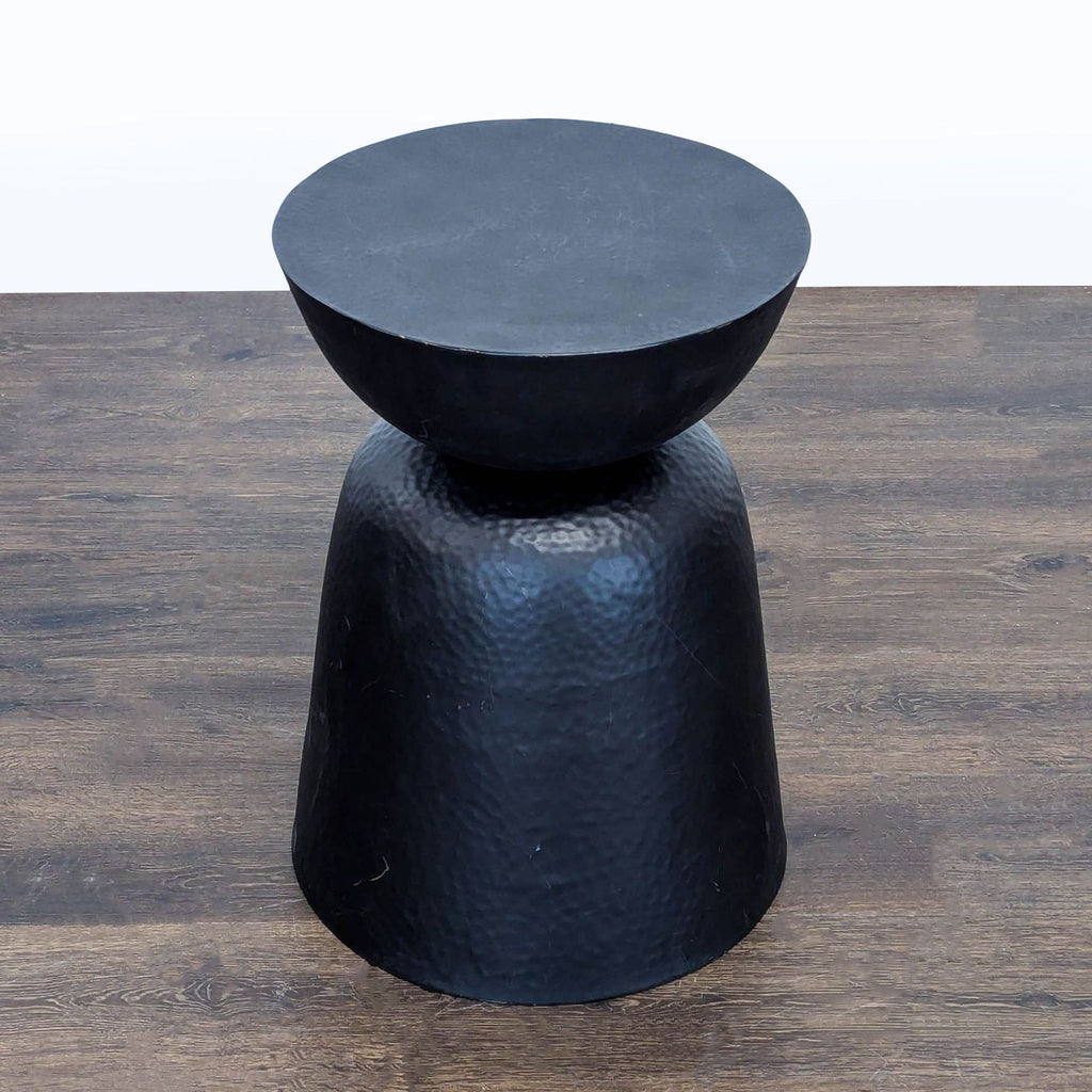 Handcrafted iron side table with powder-coated bronze finish, from Crate & Barrel.