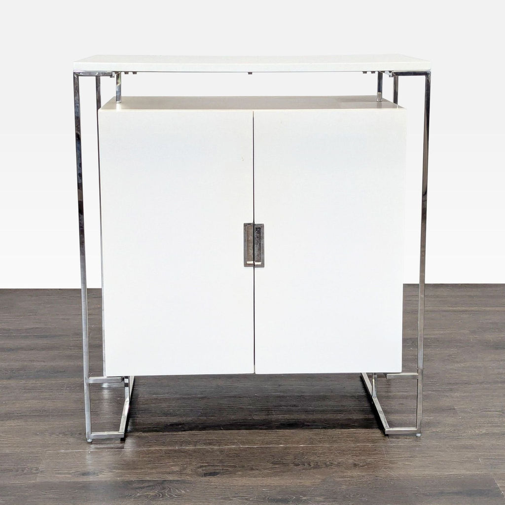West Elm white lacquer cabinet with chrome frame, 12-bottle cubbies, and glass racks, categorized as Other.  