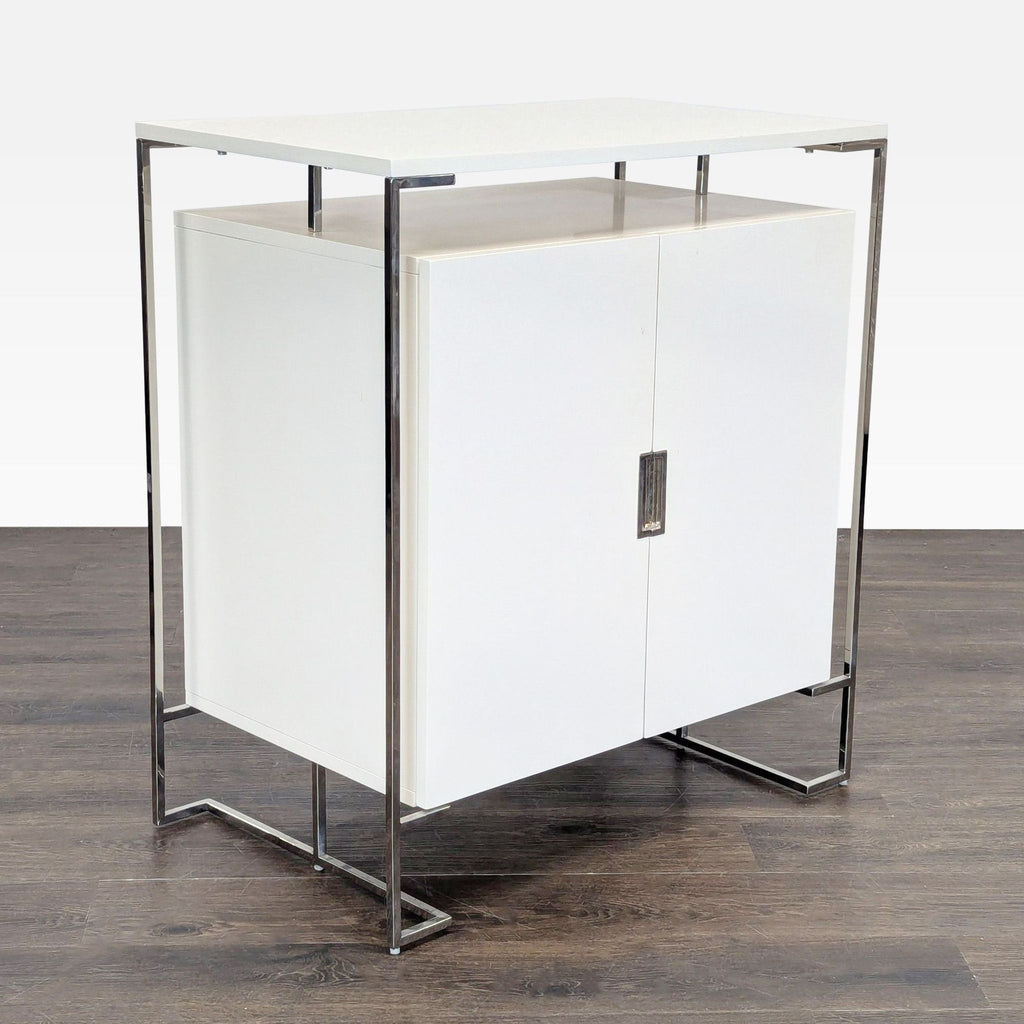 Sleek West Elm storage cabinet in white lacquer with chrome base, featuring wine cubbies and glass racks.