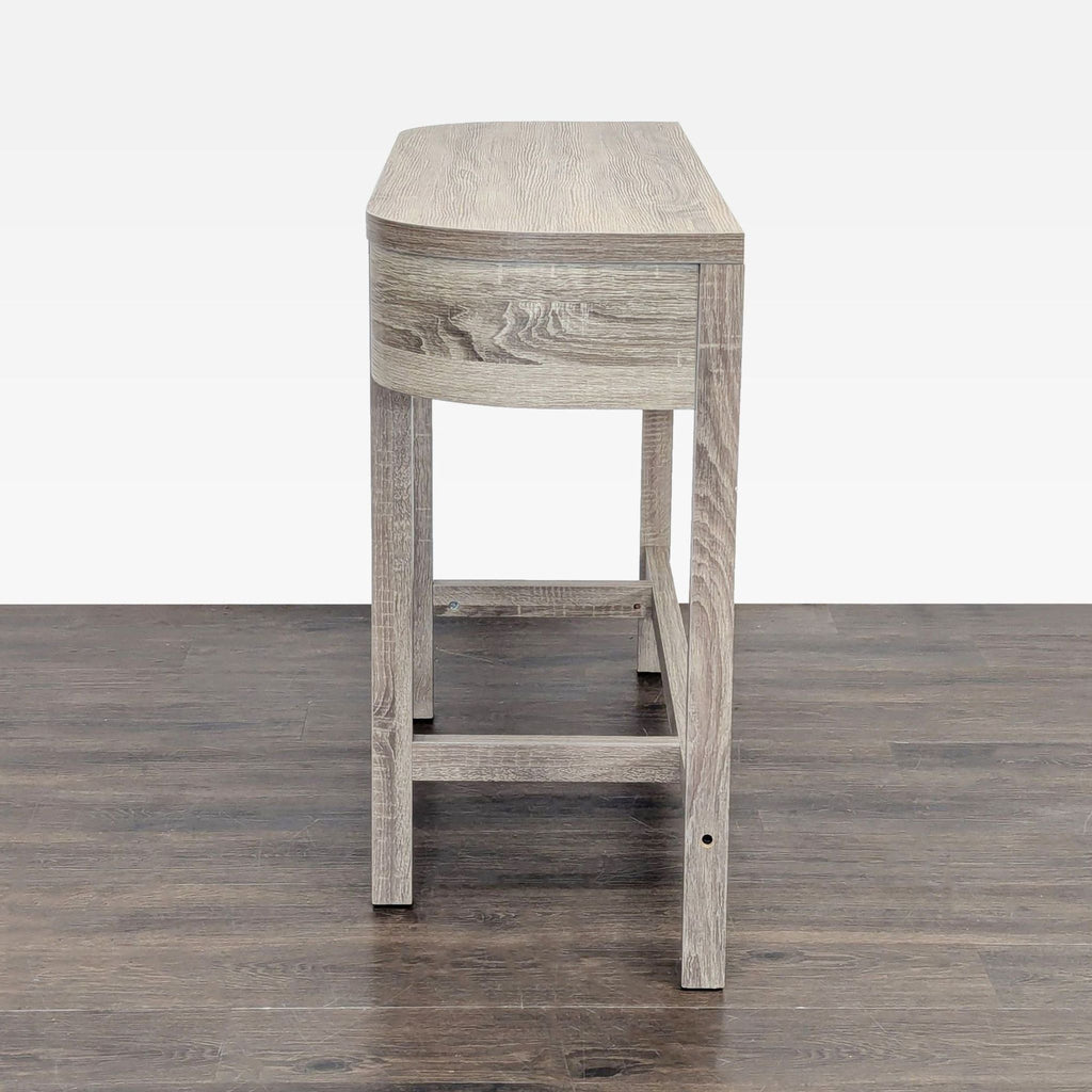 3. Profile view of a sleek light wood side and console table with rounded edges and straight legs.