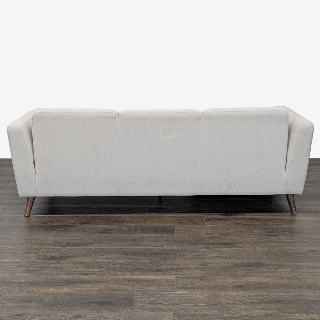 Beige sectional sofa with solid wood legs, combining comfort and style, from Moe's Home Collection.