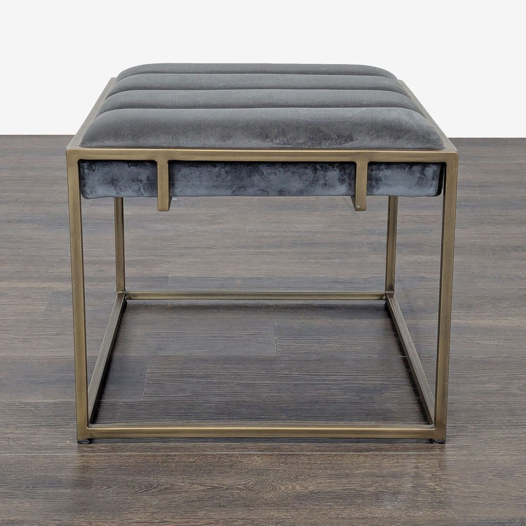 3. Velvet cushioned stool with vertical tufting and brass-finished frame, square design, shown from above.