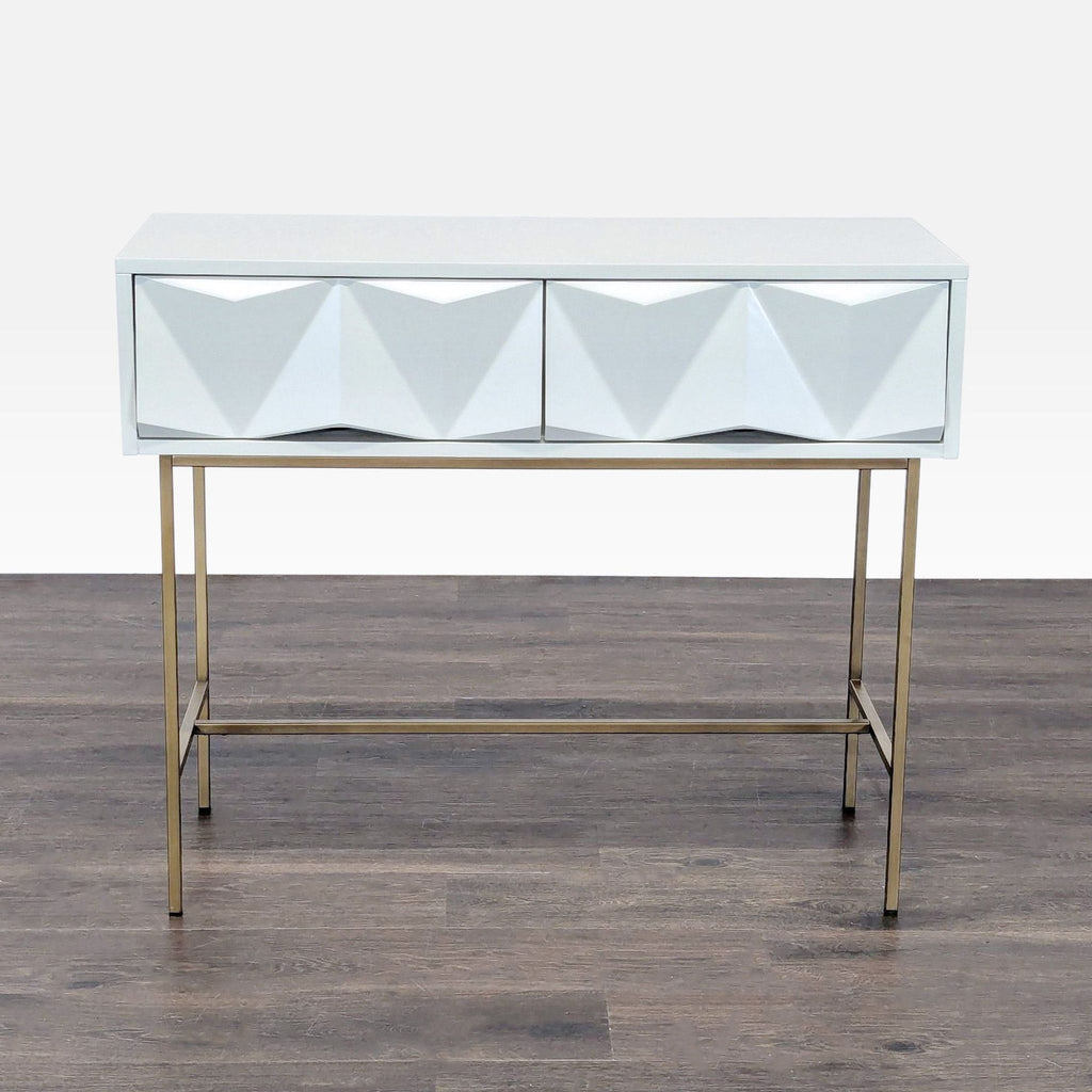 Modern West Elm side table with powder-coated brushed metal drawers and antique brass-finished legs.