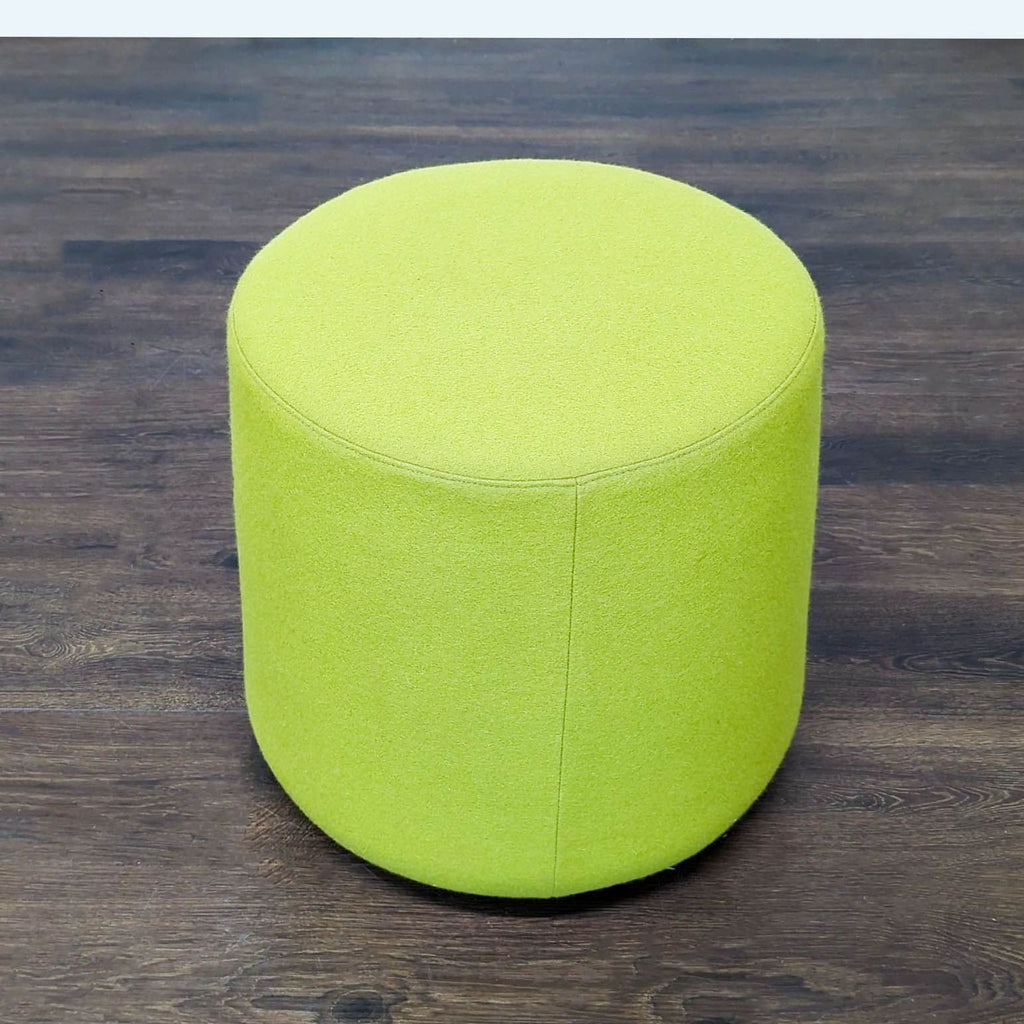 Kona Pouf from Hightower, featuring an ultra-durable leather base for stability and easy movement.