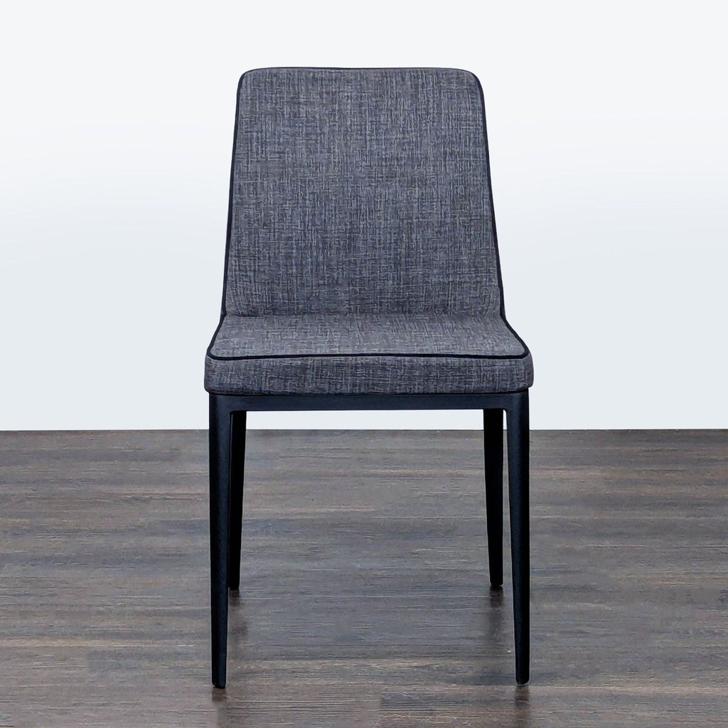Modern dining chair with metal frame from Moe's Home Collection, perfect for contemporary dining spaces.