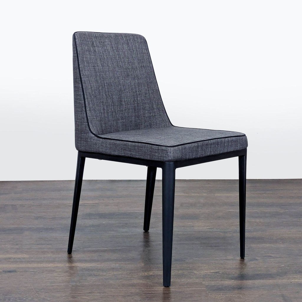 Moe's Home Collection dining chair featuring a sleek metal frame design for stylish, durable seating.
