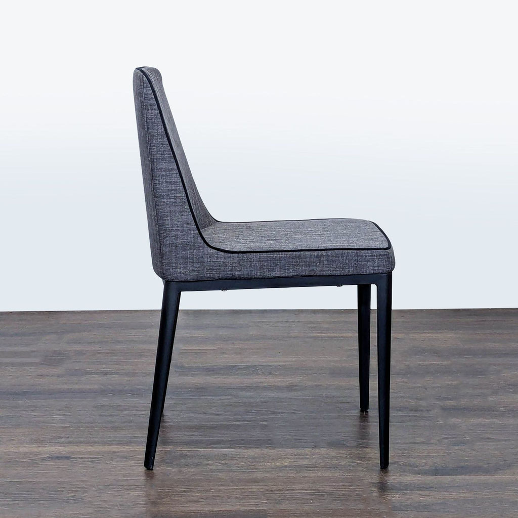 Dining chair by Moe's Home Collection, showcasing a sturdy metal frame under the Dining Chairs category.