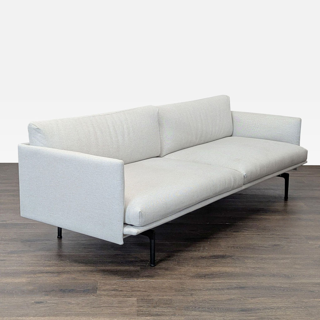Modern 3-seater by Design Within Reach - Muuto, featuring spacious light upholstery and sleek frame.