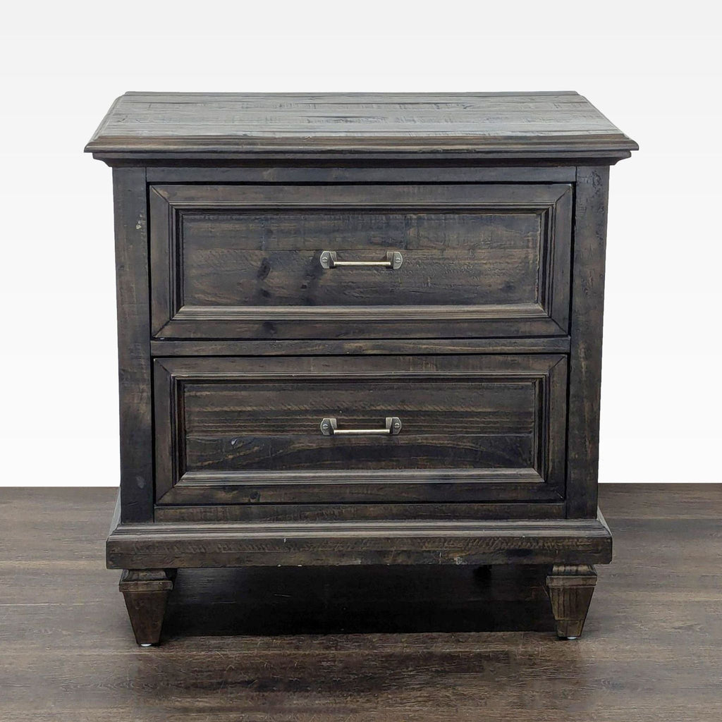 Magnussen weathered charcoal two-drawer end table with brushed pewter handles, compact and modern.
