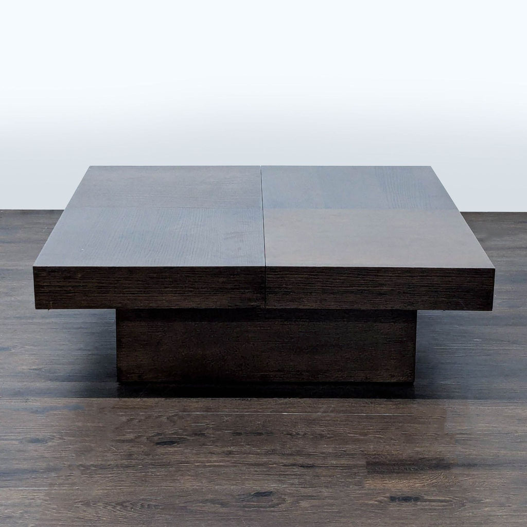 1. Square dark wood coffee table with a thick tabletop and sturdy central base, shown on a wood floor.  