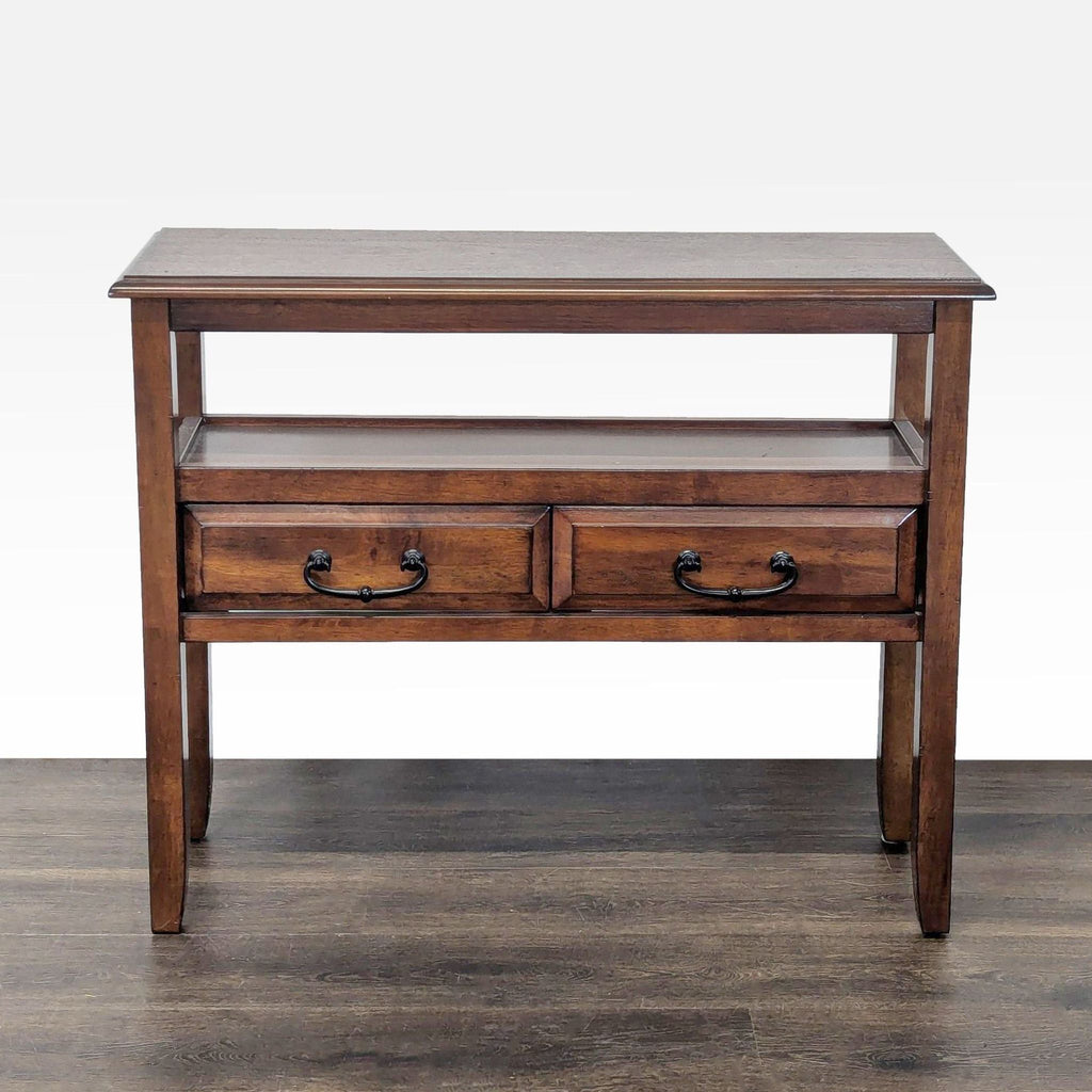 1. Pier 1 Imports side table with a rich brown finish, open shelf, and two drawers, front view.