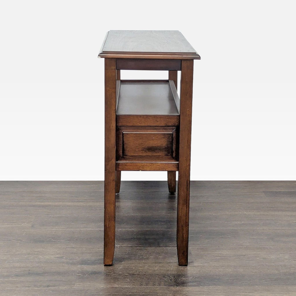 3. Slim side profile of a Pier 1 Imports wooden console table with straight legs and clean lines.