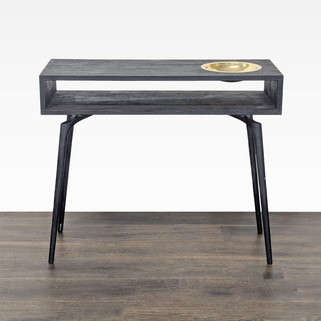 Rectangular console table with a dark wood top, open shelf, and inset brass bowl, designed by Ayush Kasliwal.