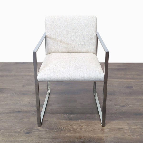 Linen upholstered dining chair with metal frame by Brownstone.  
