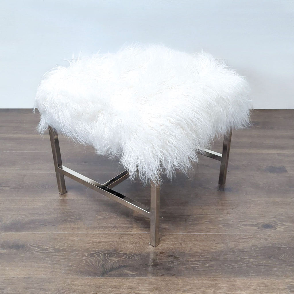1. Modern stool with a fluffy white faux fur seat and sleek chrome metal legs on a wooden floor.