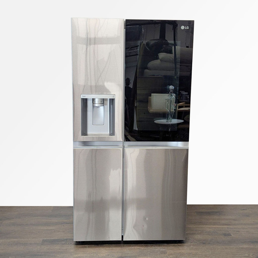 LG side-by-side stainless steel refrigerator with water and ice dispenser, spacious shelves, and door bins.  