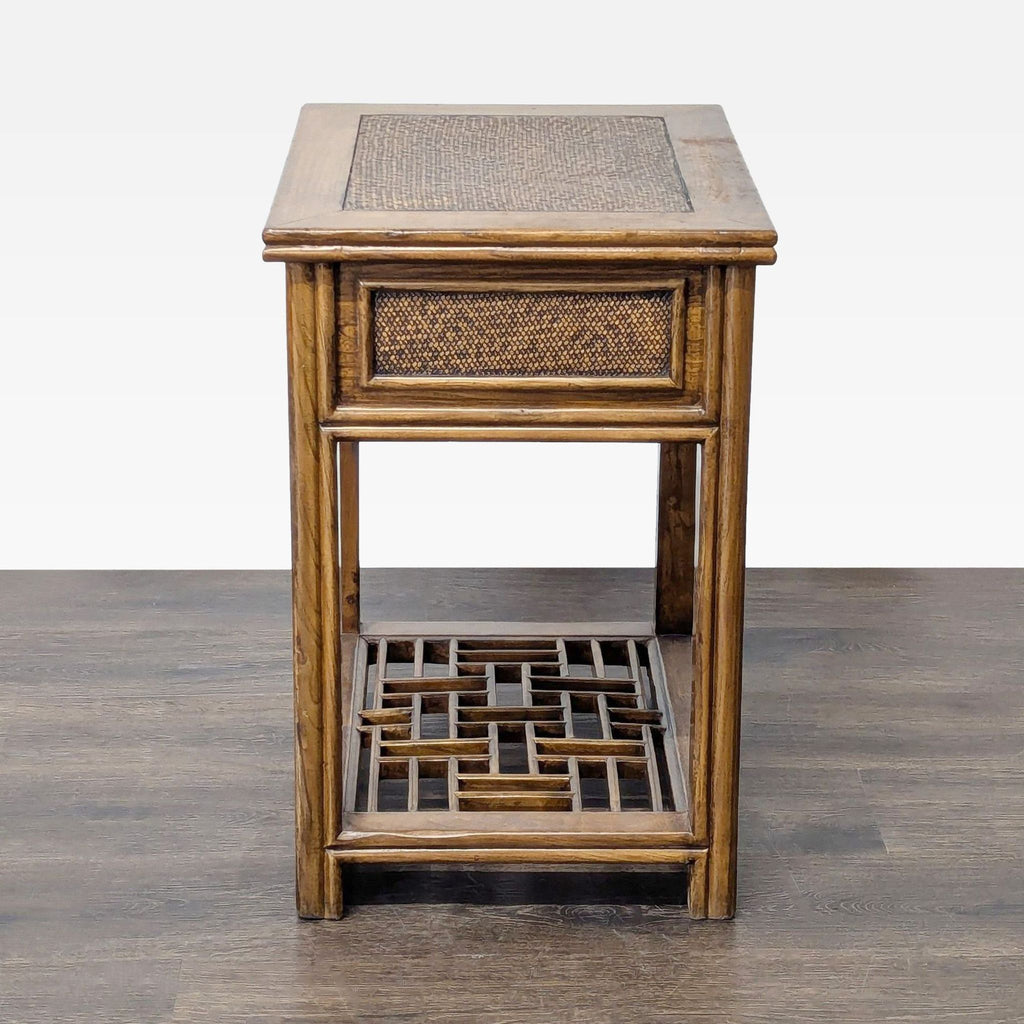 Natural bamboo end table with rattan top, drawer, and lattice lower shelf for extra storage.