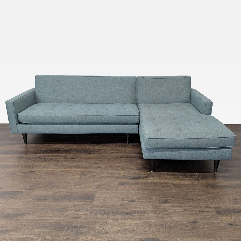 Room and Board blue sectional sofa with right-side chaise, slim arms, and tapered legs in a modern style.  