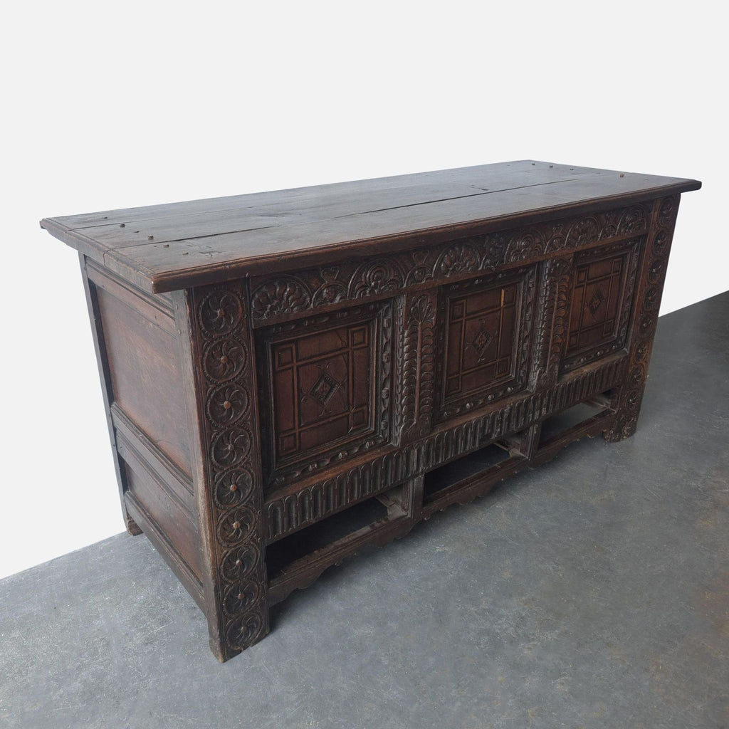 Vintage mule chest trunk, an ancestor to the chest of drawers, with ornate craftsmanship and open drawer space.