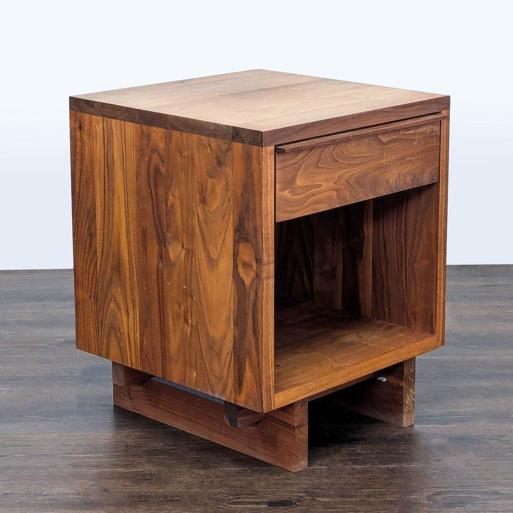 3. Angled side view of Vermont Furniture Designs end table highlighting rich walnut, drawer, and open lower shelf.