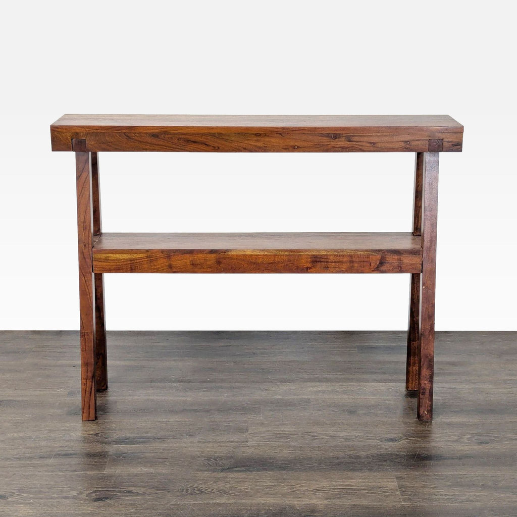 1. Wooden console table with a lower shelf and simple, sturdy design against a light background.