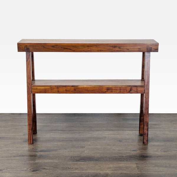 1. Wooden console table with a lower shelf and simple, sturdy design against a light background.