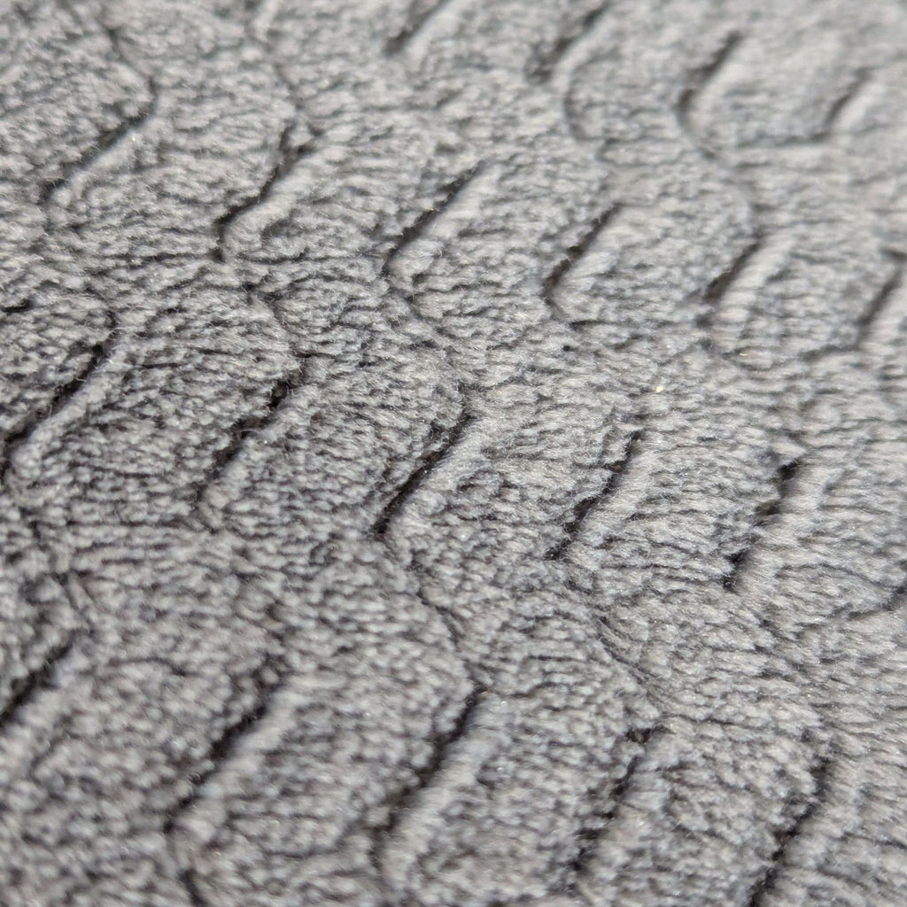 2. Plush gray Lounge & Co. bean bag chair, perfect for extra seating or lounging, suitable for all ages.