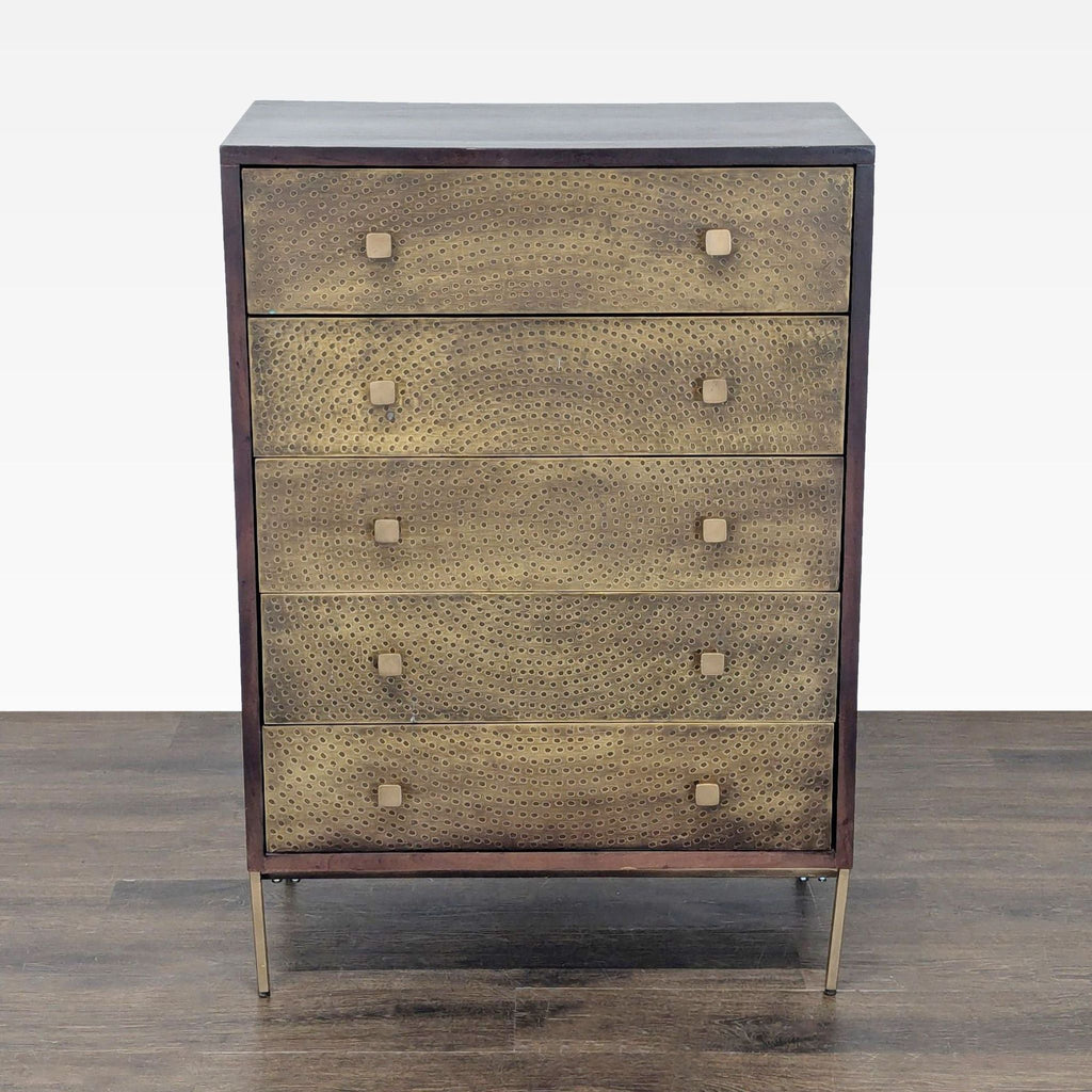 West Elm dresser with five brass-accented drawers, dark wood finish, and modern metal legs for stylish storage.