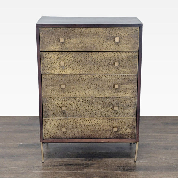 West Elm dresser with five brass-accented drawers, dark wood finish, and modern metal legs for stylish storage.