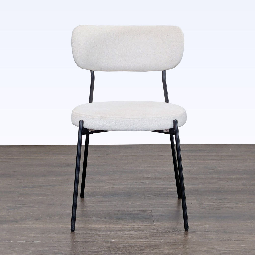 Set of Duhome mid-century modern dining chairs with curved backrests and sleek metal legs.  