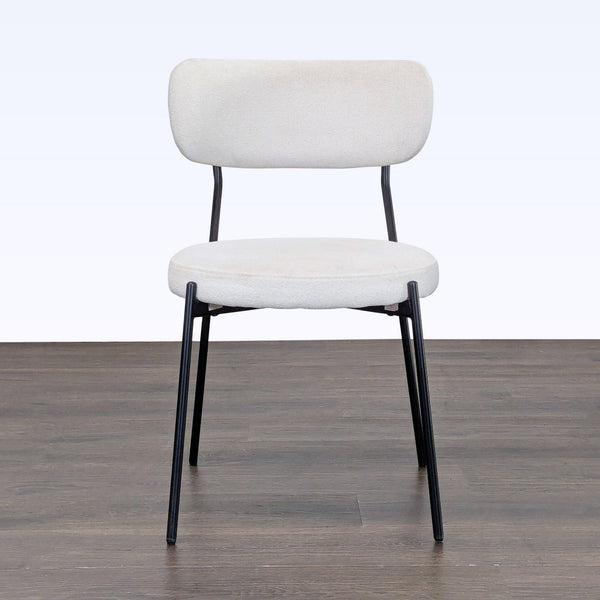 Set of Duhome mid-century modern dining chairs with curved backrests and sleek metal legs.  