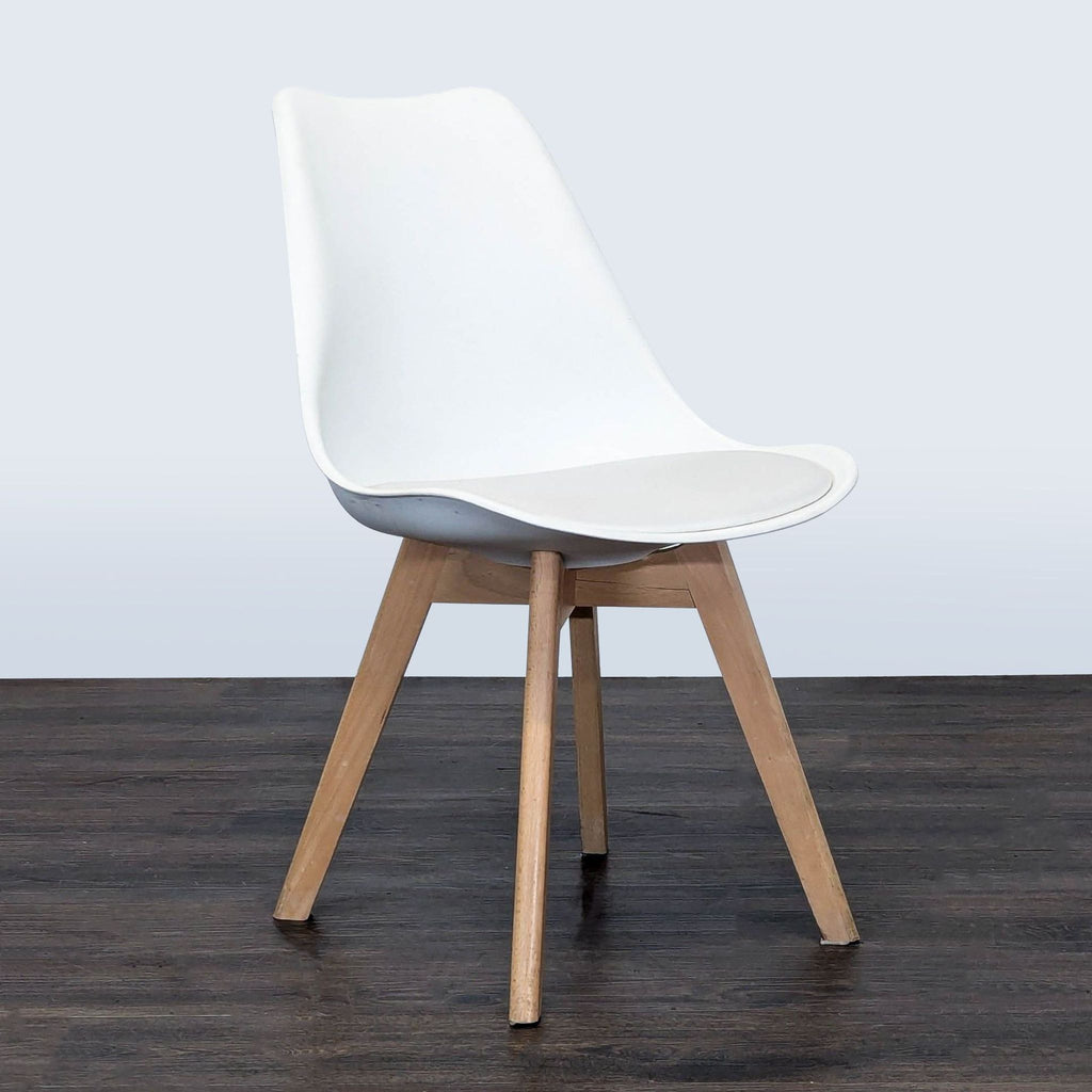 Dining chair featuring beech wood legs, padded cushion, and a sleek matte-finish seat.  