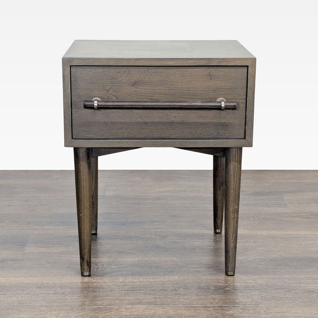 West Elm end table with walnut-stained oak veneer, engineered wood body, and hand-stitched leather drawer pull.