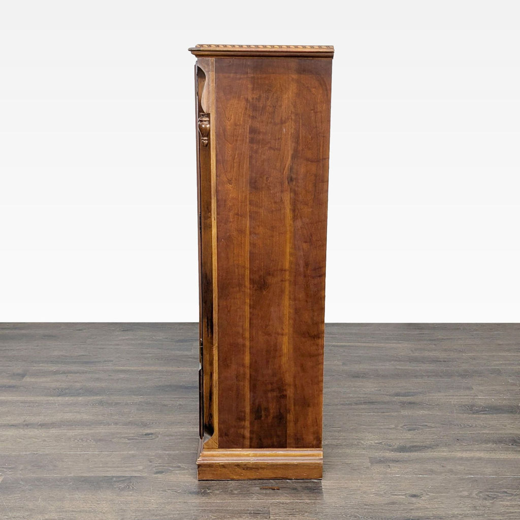 3. Side profile of a tall wooden dresser, highlighting its smooth finish and sturdy construction in the dressers category.