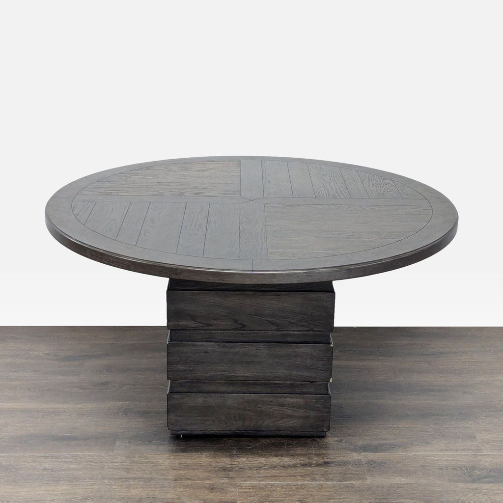 Home Meridian dining table features a rich tobacco finish, notable wood grain, and a unique block pedestal base.