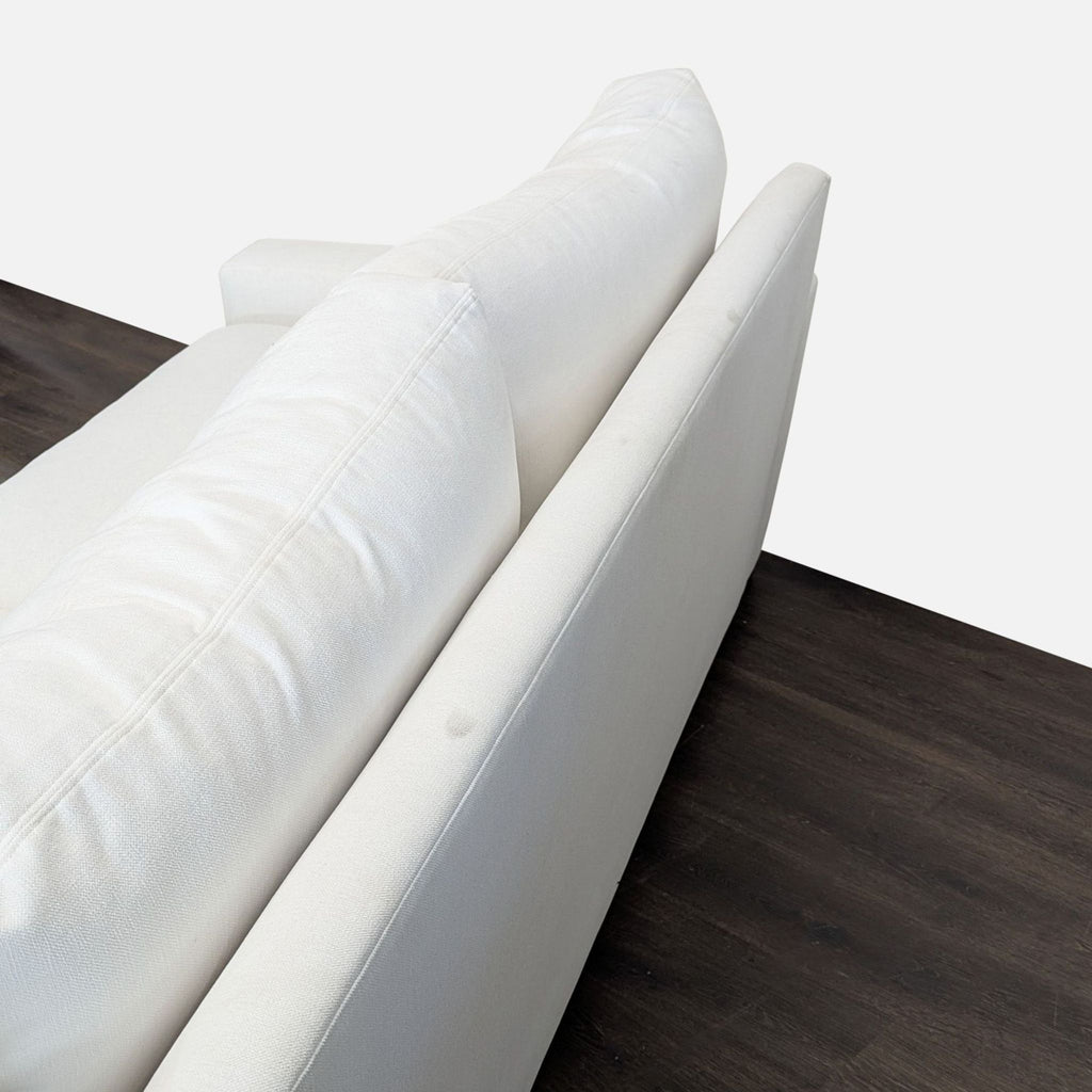 Sectional from Restoration Hardware with clean design, roomy seating, and plush cushions, ideal for living rooms.