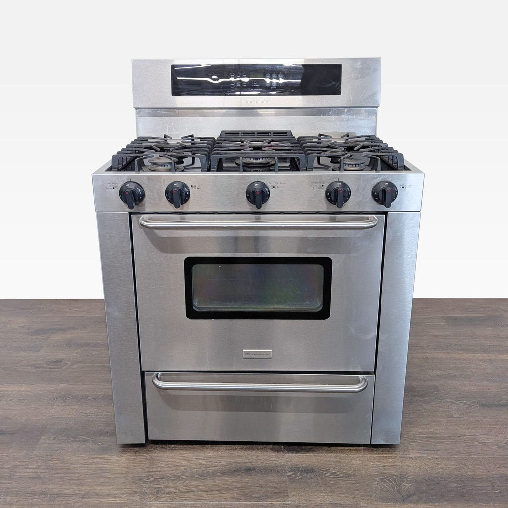 1. Frigidaire stainless steel stove with 5 burners, spacious oven with window, and bottom broiler drawer.