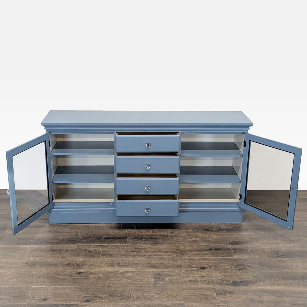 Repainted credenza by Pottery Barn featuring four drawers, adjustable shelves, and glass-fronted cabinet doors.