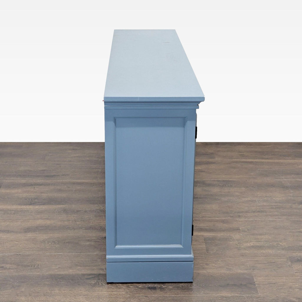 Glass-door sideboard from Pottery Barn, with adjustable shelves and four drawers; painted over initial finish.