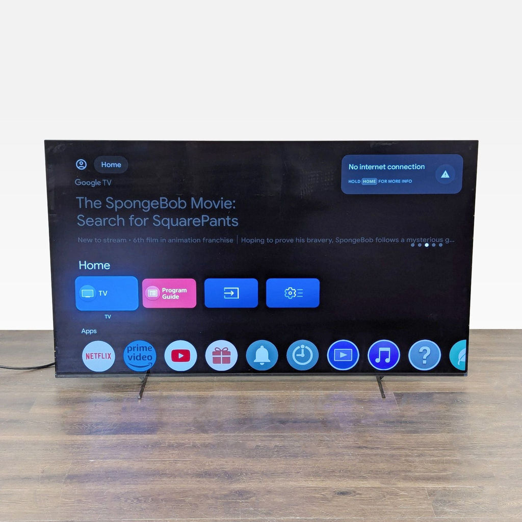 Sony 55-inch 4K Smart TV with slim design and Google TV, displaying vivid picture quality on a sturdy stand.  