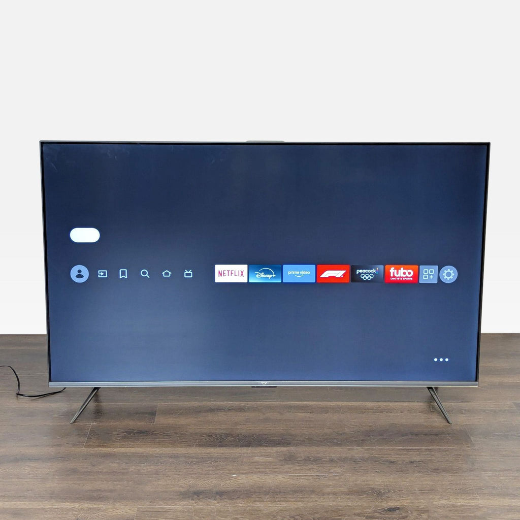 Large Amazon TV with clear 4K display, integrated streaming services, and stylish, contemporary appearance.