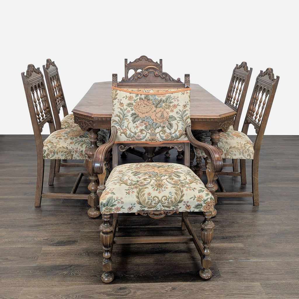 Elegant wooden dining set with carved table and six vintage floral-upholstered chairs, ideal for gatherings.