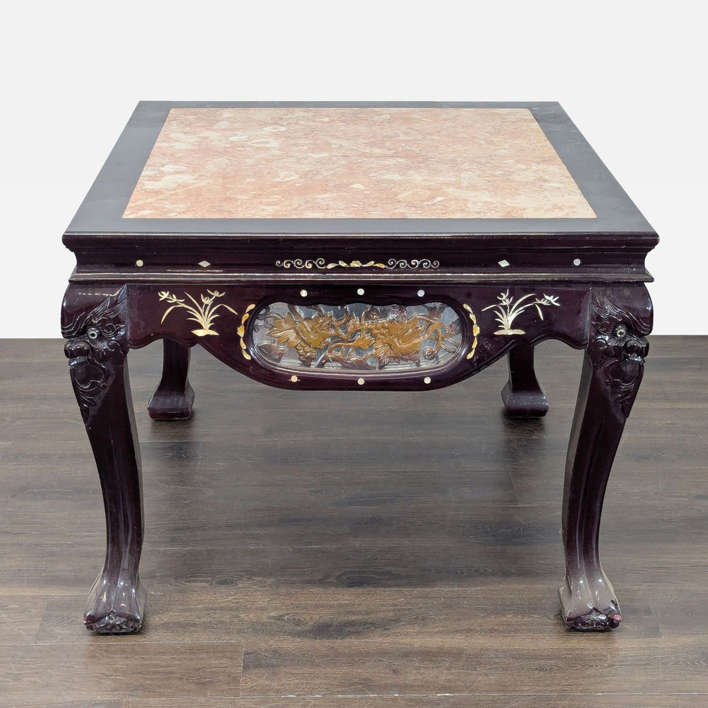 2. Square wooden end table featuring deity-motif legs, carved panels, mother of pearl inlay, and a pink marble top.