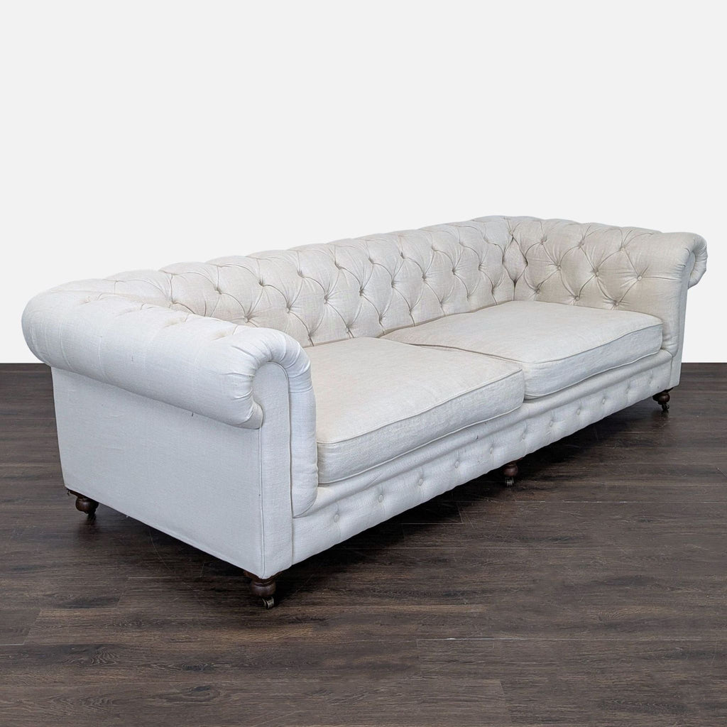 Elegant 3-seat sofa with classic wooden legs and soft linen fabric, perfect for stylish living rooms.  